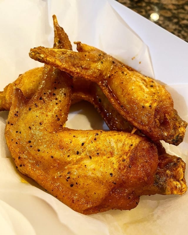 10 Cajun Lemon Pepper Wings.